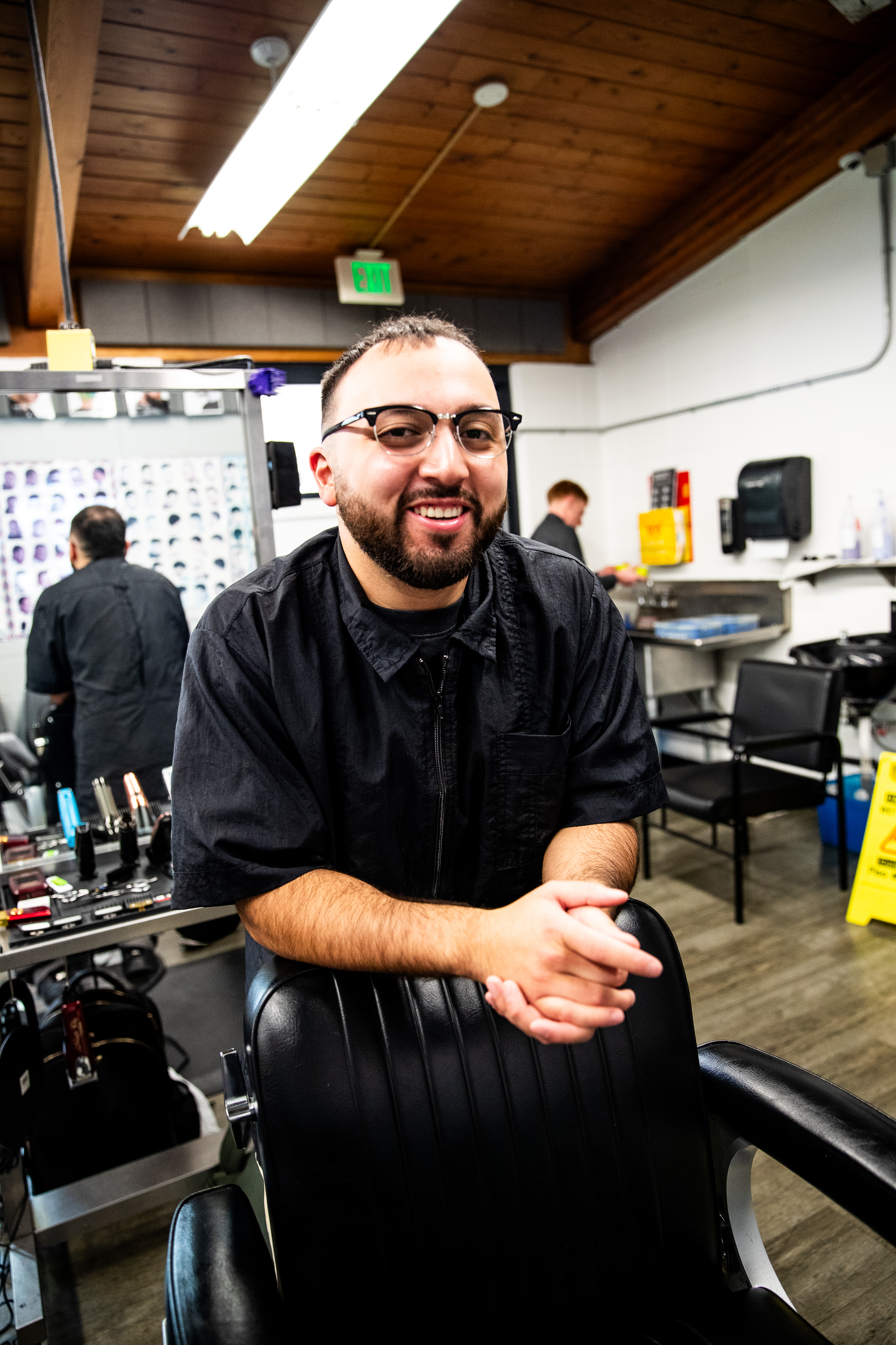 Man in workshop smiling