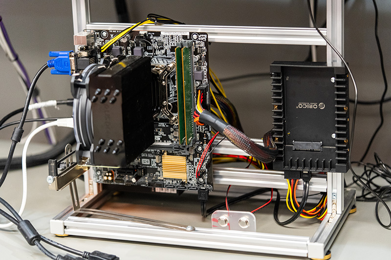 a close up of the computer built without a case to learn about the components