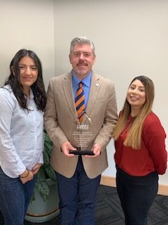 - Ogden Weber Technical College (Left) Helen Salcedo, President James R. Taggart, and Priscilla Martinez with the LUPEC award.